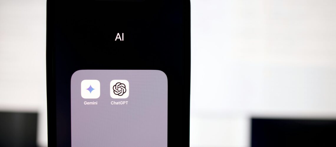 a close up of a cell phone with an ai button