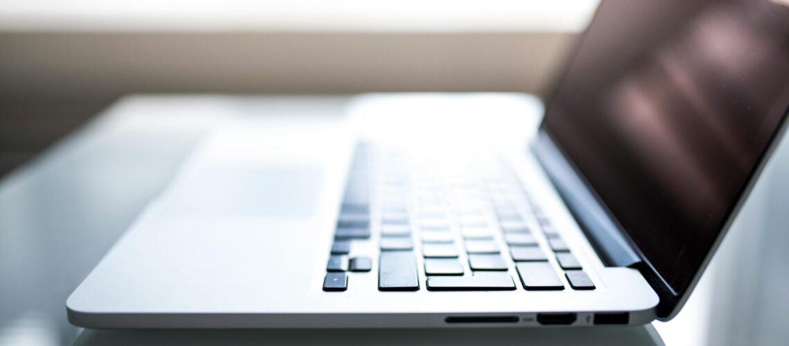 shallow-focus-photography-of-macbook