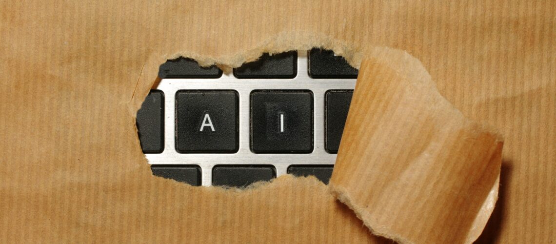 A piece of cardboard with a keyboard appearing through it